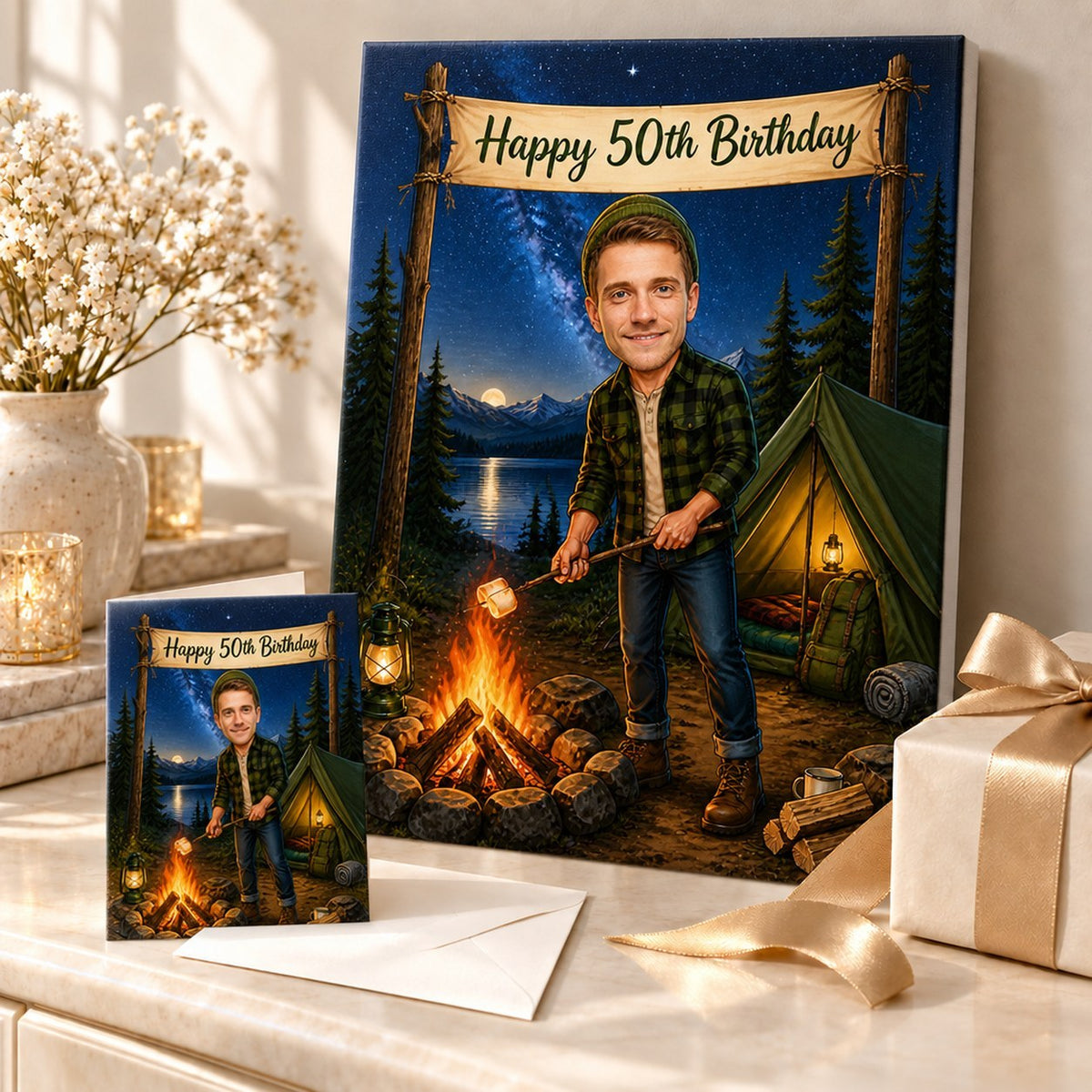 Camping caricature on canvas and greeting card displayed with wrapped birthday gifts.