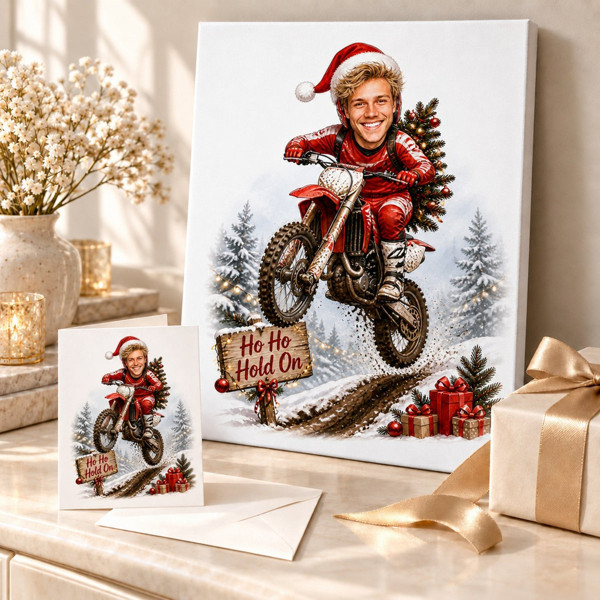 Motocross Christmas caricature on canvas and 5x7 card displayed beside wrapped holiday gifts.